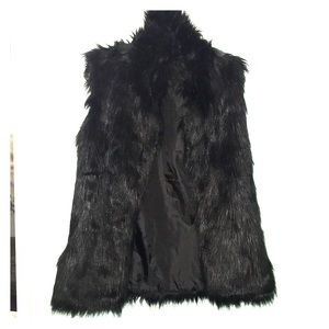 Gently worn faux fur black vest